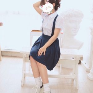 A 707 escort girl, portrayed as a girl in a school uniform, is seen peacefully sitting on a bench.