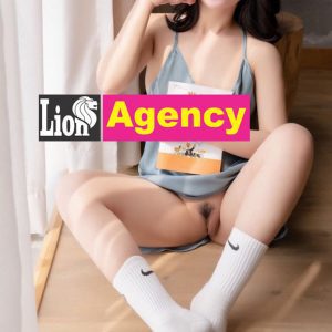 A young woman wearing a 707 mask.