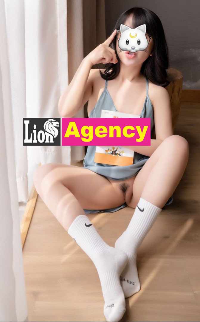 A young woman wearing a 707 mask.