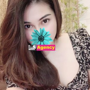 A 458 with long hair is posing for a picture.