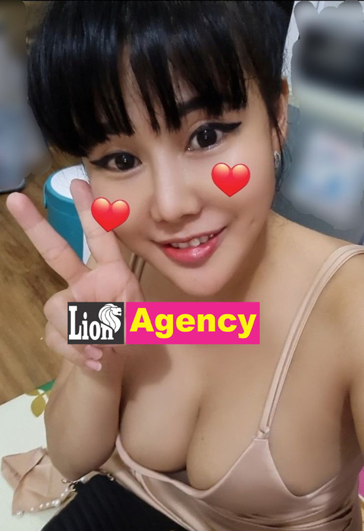 A 407 escort girl with big breasts and a heart sign.