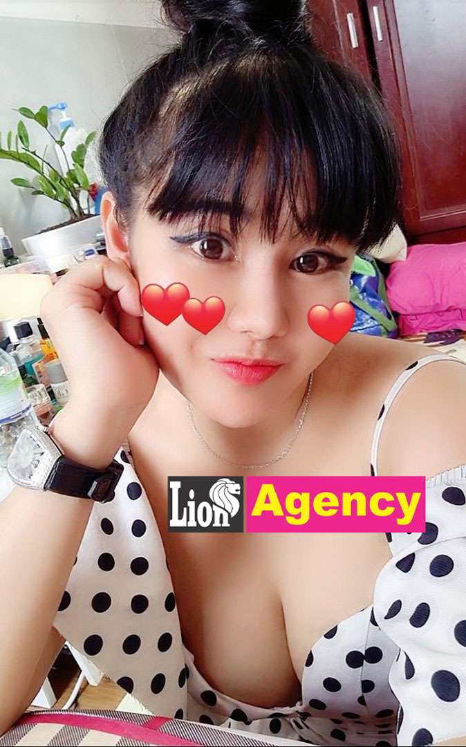 An alluring escort in a vibrant polka dot dress with hearts elegantly adorning her face, 407.