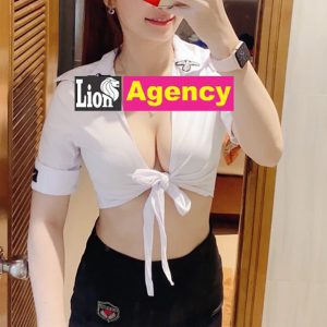 A woman is taking a selfie in a bathroom at the 681 Star Club.